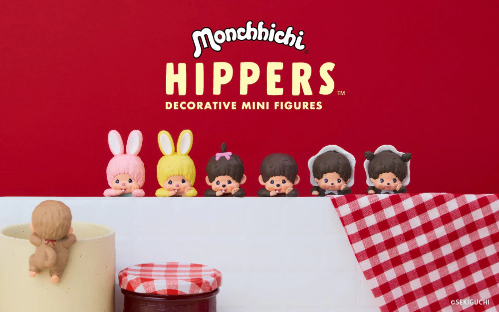 Monchhichi Hippers decorative mini figures on a red background with checkered tablecloth.