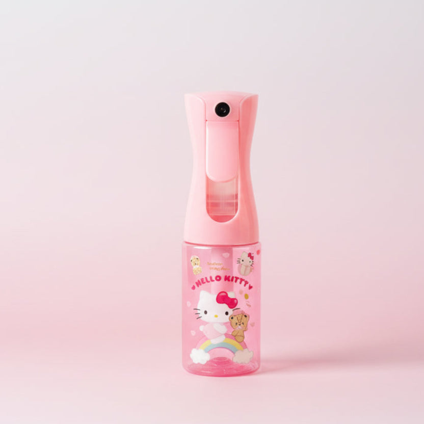 Pink handheld sprayer with hello kitty on a gradient pink background