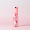 Pink handheld sprayer with hello kitty on a gradient pink background