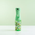 Green spray bottle with Keroppi from Sanrio on a table with other colorful bottles in the background.
