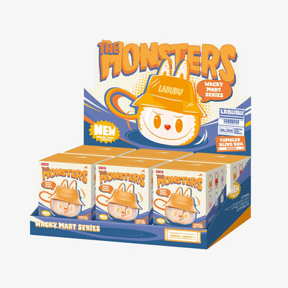 Display box of 'The Monsters' wacky mart series with cartoon character on a white background