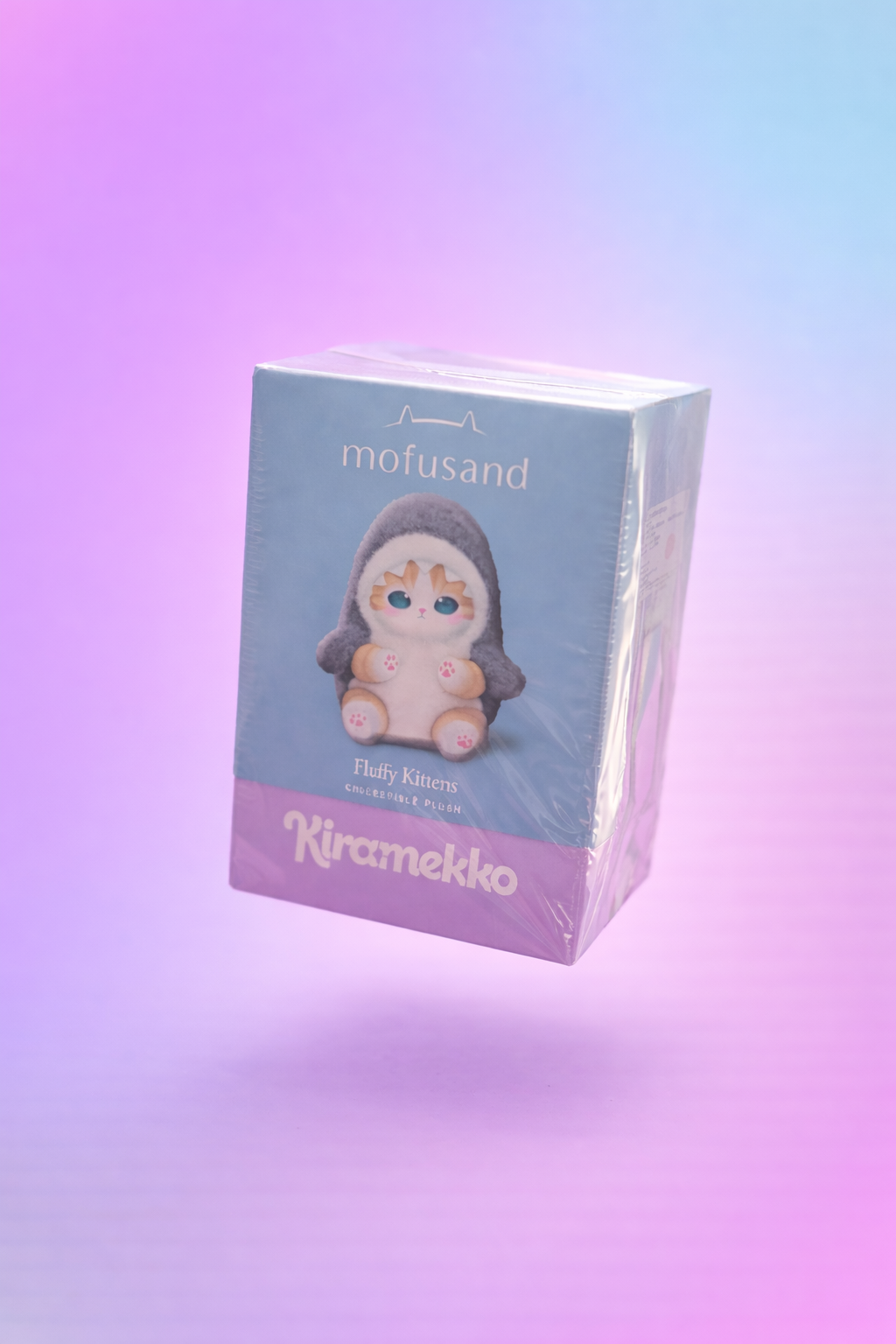 Mofusand Fluffy Kittens Kiramekko blind box collectible toy floating on pastel gradient background